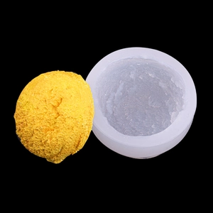 Spherical silicone mold for ice cream candles and yellow textured dessert sphere