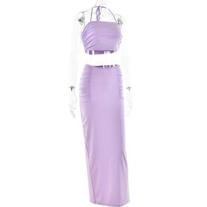 Detail of lavender halter bandeau top and maxi skirt set with elegant pleated texture