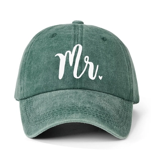 Washed dark green cotton baseball cap featuring Mr. embroidery and adjustable strap