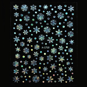 Detailed holographic laser snowflake nail art stickers with dots on a black background
