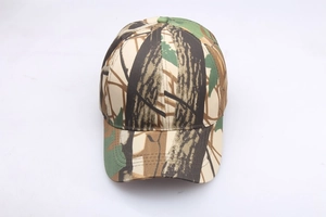 Detail of leaf camouflage baseball cap with durable canvas texture and forest pattern