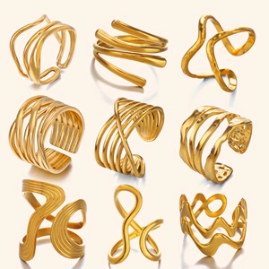 Collection of nine 18K gold plated minimalist crisscross and wavy open rings for women