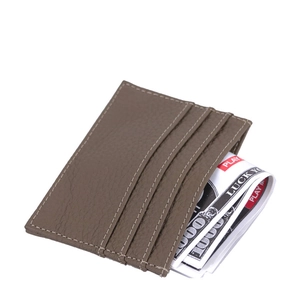 Close-up of brown litchi pattern leather card holder with multiple card slots and stitching