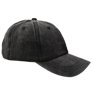 Close-up of washed black cotton baseball cap showing vintage texture and stitching