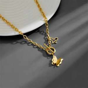Golden multi-layer chain necklace with double butterfly pendant and OT buckle design