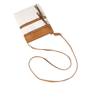 Top view of brown and white crossbody phone bag with gold zippers and tassel detail
