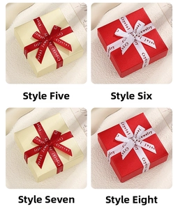 Four elegant jewelry gift boxes with ribbons and textured finishes for rings and earrings