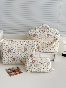 Quilted makeup bag set with purple floral and bear patterns for travel organization