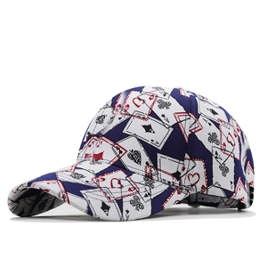 Navy blue baseball cap with all-over playing card print and curved brim for hip-hop style