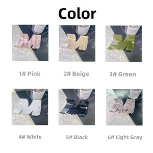 Detailed view of six different colors and patterns of M-shaped acetate hair claw clips