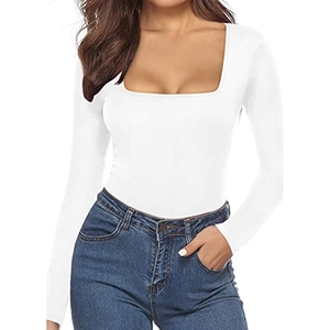 Women's slim fit white long sleeve square neck bodysuit yoga top worn with jeans