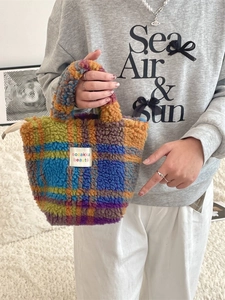 Colorful plaid plush tote bag for women with soft faux fur texture and top handle
