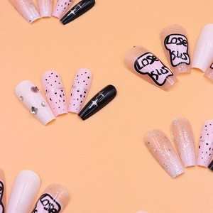 Pink and black graffiti fake nails with silver stars and rhinestone details
