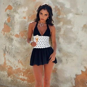 Polka dot deep V-neck dress with black pleated skirt and backless design for women