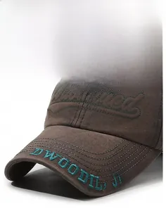 Close-up of brown twill cotton baseball cap featuring detailed floral embroidery and text