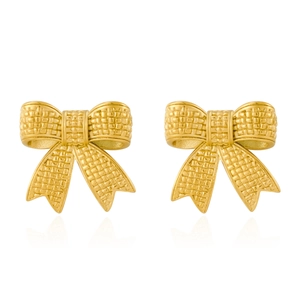 Detail of gold bow earrings featuring a textured woven metal finish and symmetric design