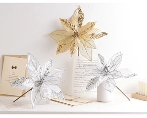 Close-up of champagne gold and silver artificial Christmas flowers with glitter sequins