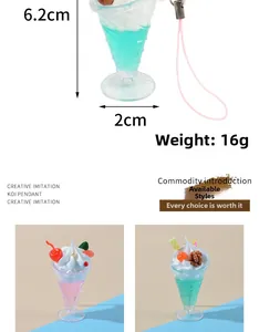 Macro view of 6.2cm faux fruit sundae keychain with cream and cherry toppings