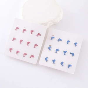 Exquisite pink and blue dolphin stud earrings with glitter finish on display cards