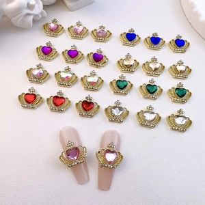 Macro detail of crown heart crystal alloy charms for nail art and DIY jewelry making
