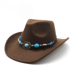 Detailed view of brown cowboy hat featuring bohemian turquoise beads and bronze hardware