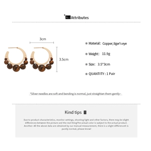 Dessin technique détaillé des boucles d'oreilles œil de tigre avec dimensions précises