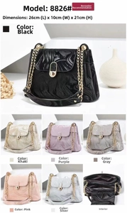 Detailed interior of wave texture bag with 26cm x 10cm x 21cm size and metal chain strap