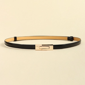 Elegant black leather belt for women featuring a minimalist golden rectangular metal buckle