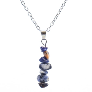 Detailed macro view of natural blue agate stone pendant on a delicate silver necklace chain