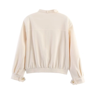 Back view of a cream white PU leather jacket featuring a stand collar and elastic hemline