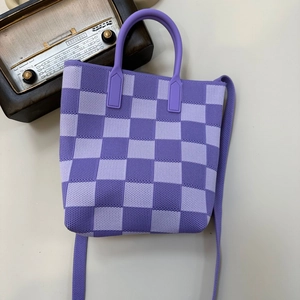 Detail view of purple checkered knitted tote bag with textured fabric and silicone handles