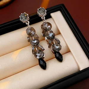 Vintage silver needle tassel earrings featuring grey crystals and black teardrop stones