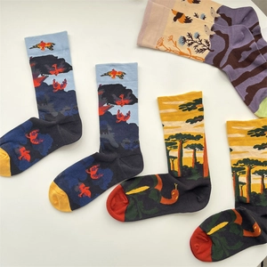 Artistic graffiti cotton socks featuring colorful bird and tree patterns on white background