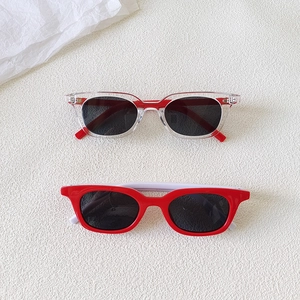 Two pairs of red cat eye sunglasses for children with UV protection and plastic frames