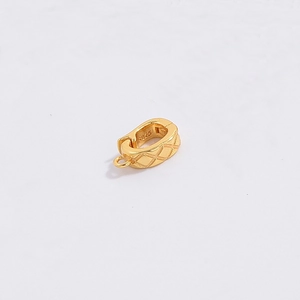 Detailed view of the gold S925 sterling silver jewelry bail with hallmark engraving
