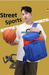 Detail of blue and orange sports backpack with large main compartment and side mesh pockets
