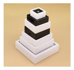 Tower-style stacked square jewelry boxes with transparent windows in black and white