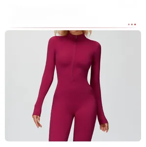 Close-up of the zipper stand collar and thermal fabric on the rose red yoga bodysuit