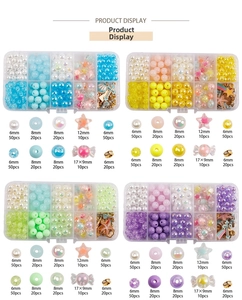 Detail showing various sizes and quantities of green DIY beads in a transparent box