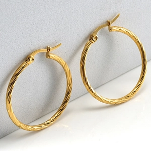 Polished 18K gold plated stainless steel twisted hoop earrings with textured spiral design