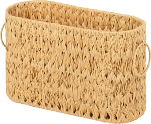 Detail of hand-woven wicker basket featuring dual ring handles and natural fiber texture