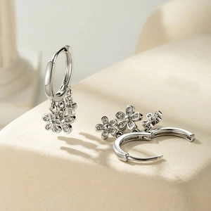 Silver hoop earrings with micro-paved zircon flower charms and dangling tassels
