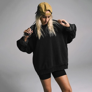 Oversized black cotton sweatshirt with drop shoulders for casual athletic women wear