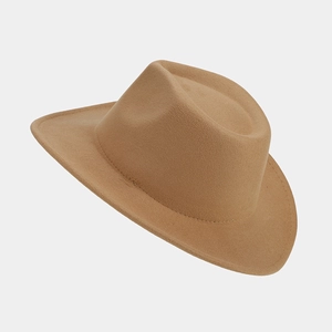 Detail of camel wool felt fedora featuring a wide brim and classic pinched crown design