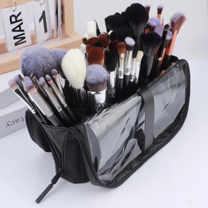 Macro view of a portable large capacity standing makeup brush bag with zip closure