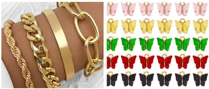 Detailed set of gold-plated chain bracelets and colorful acrylic butterfly charms