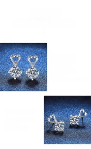 Detail view showing heart-shaped Moissanite earrings in s925 silver with claw setting