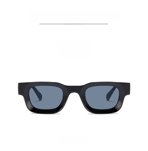 Front view of thick black frame rectangular sunglasses with dark grey lenses in retro style