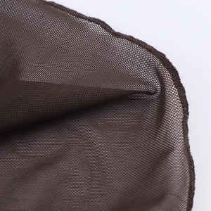 Close-up of coffee brown mesh fabric detail showing fine mesh texture and transparency