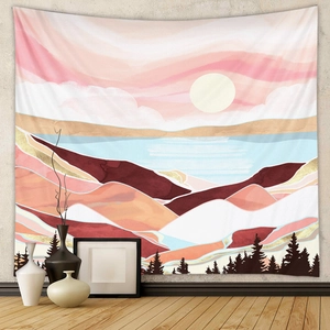 Detailed view of abstract mountain tapestry with sun and pine trees on a grey wall